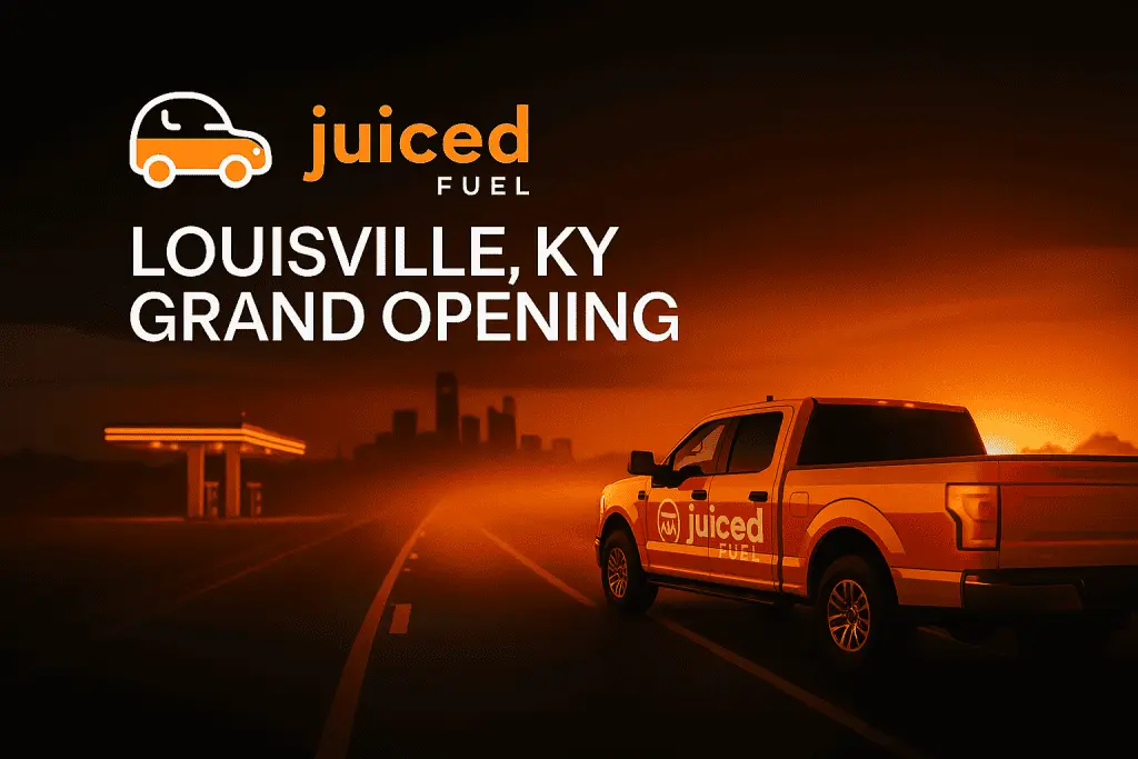 Bright orange Juiced Fuel truck on a road at sunset with Louisville skyline in the background and text reading ‘Louisville KY Grand Opening’.